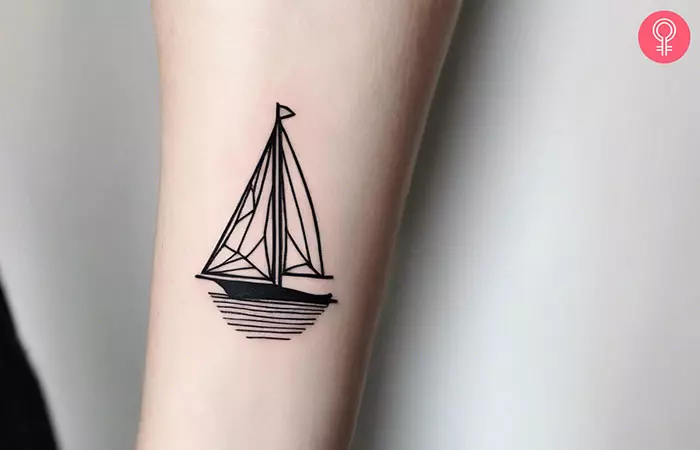 Woman with a minimalistic sailboat tattoo design on her forearm