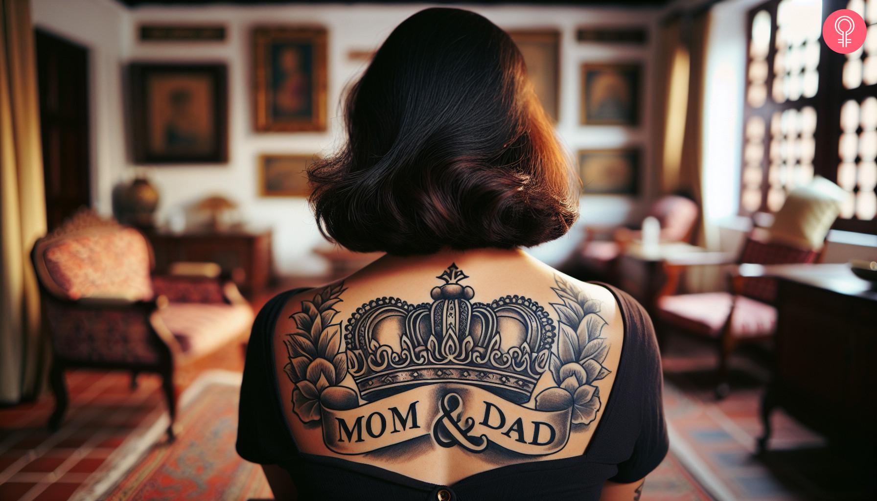 Mom and dad crown tattoo on upper back