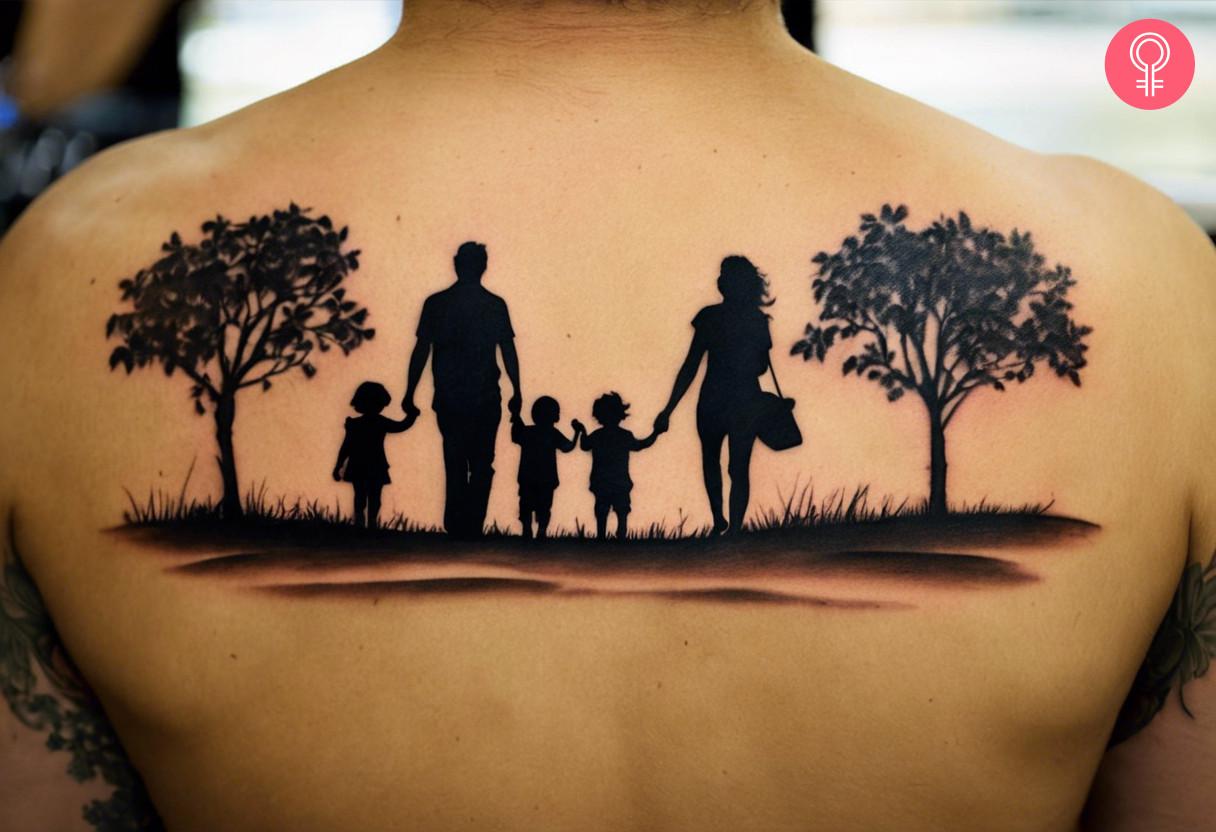 Mother and father with their children tattoo