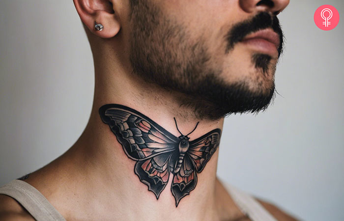 Moth tattoo on the throat