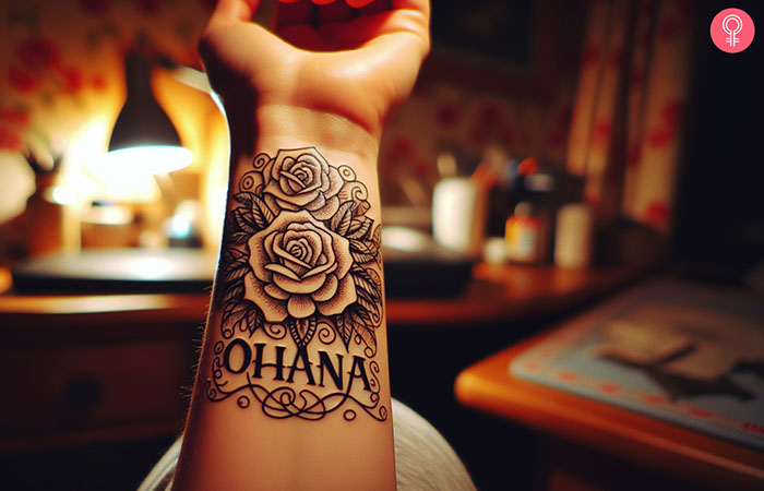 Ohana and rose tattoo on the wrist of a woman