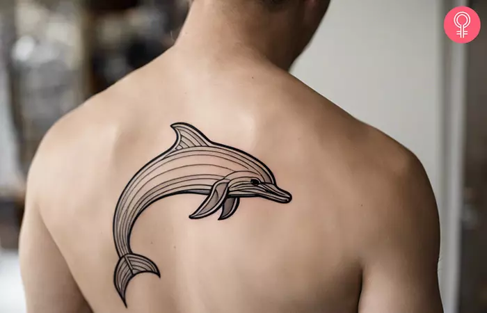 Outline dolphin tattoo on the back