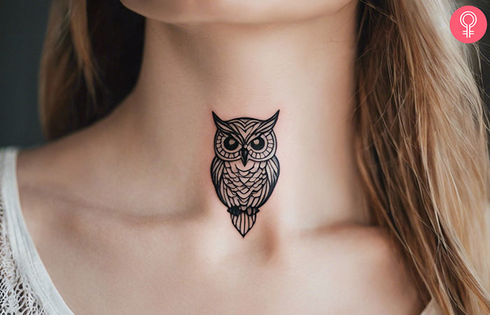 Owl tattoo on the throat