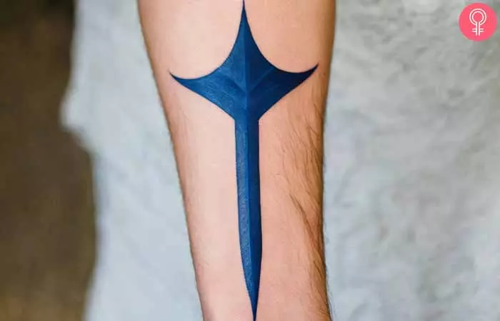 Poseidon symbol tattoo on the forearm