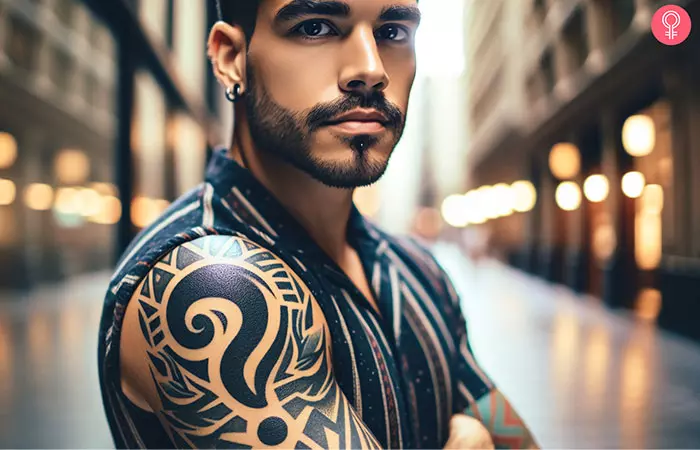 A question mark tattoo on the man’s upper arm