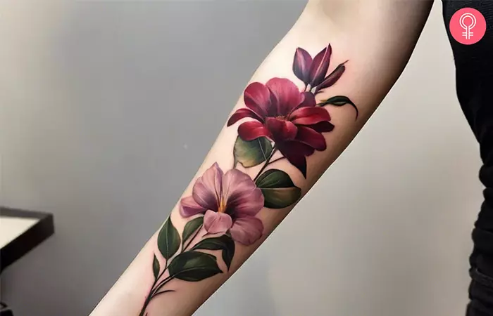 Realistic tattoo of flowers on the forearm