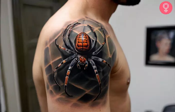 A man wearing a realistic 3D spider tattoo on the upper arm