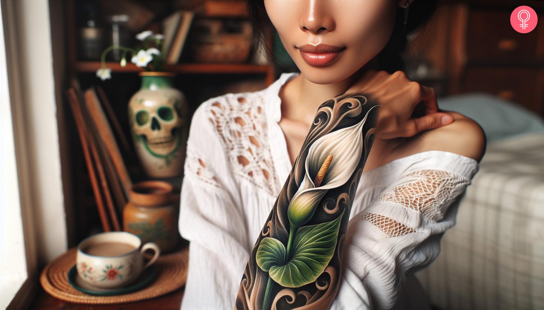 Realistic Calla Lily tattoo on a woman's forearm