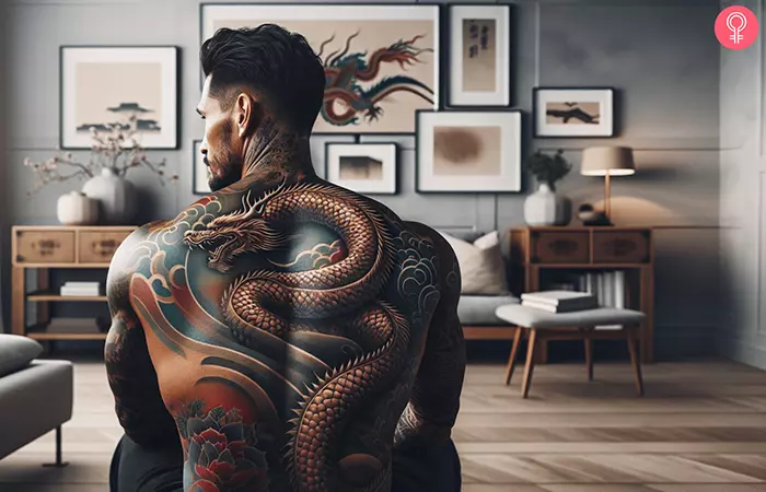 Realistic, fierce Japanese dragon tattoo on the back of a man