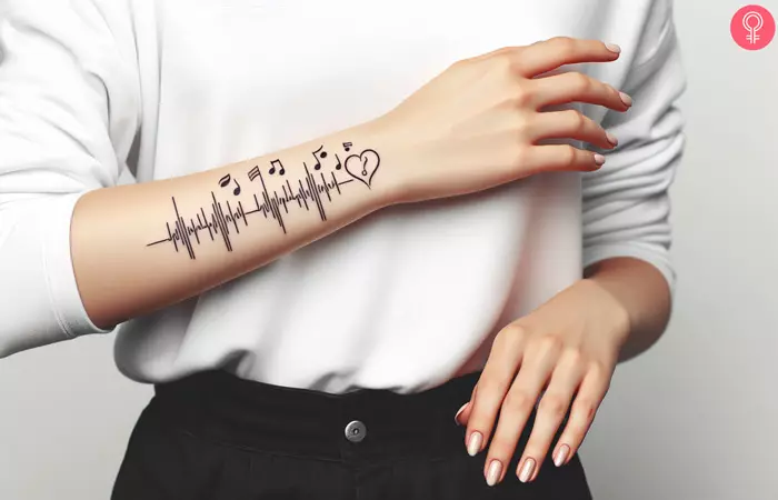 A woman sporting ‘rhythm goes on a heartbeat’ tattoo on her forearm