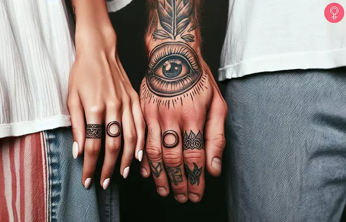 Couple with matching ring frames wedding tattoos