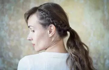 woman with side braid ponytail