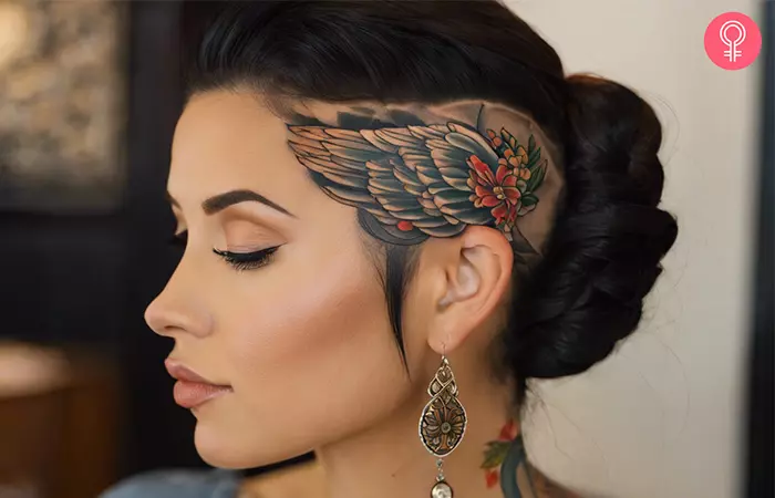  A woman’s side profile with a head tattoo