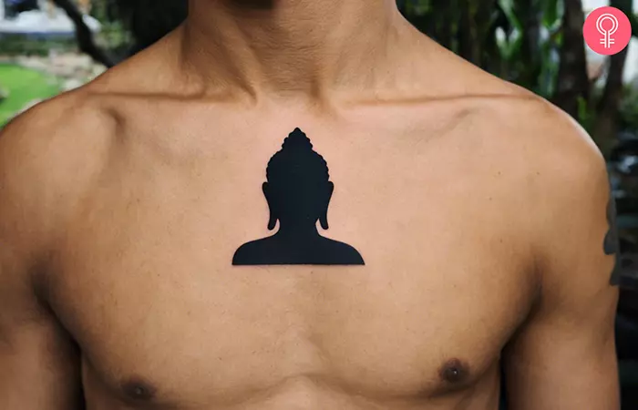 Simple Buddha tattoo on the chest of a man
