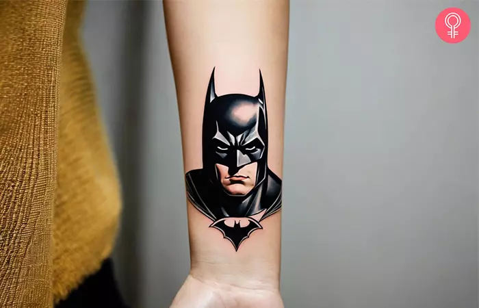 A small Batman tattoo on the wrist 