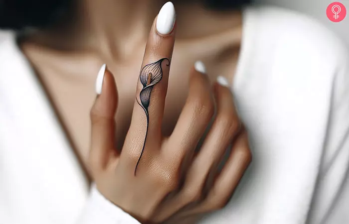 Small calla lily tattoo on finger