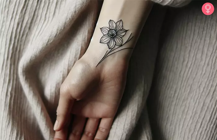 A daffodil tattoo on the wrist