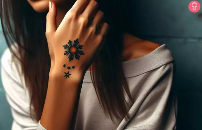 small Filipino Sun and Stars Tattoo