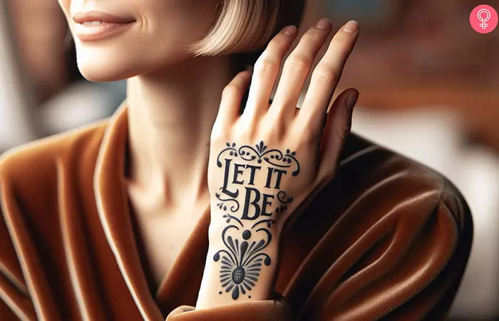 A stylish let it be tattoo on the hand