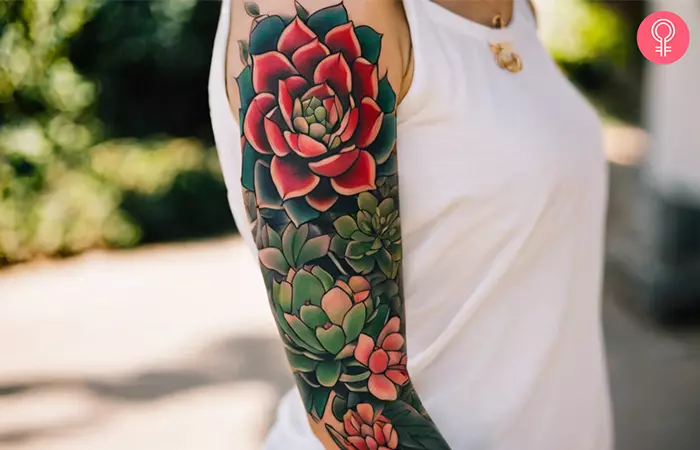 woman with succulent tattoo sleeve on her arm
