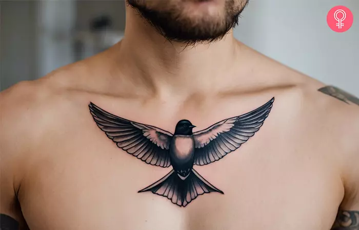 Swallow tattoo on chest