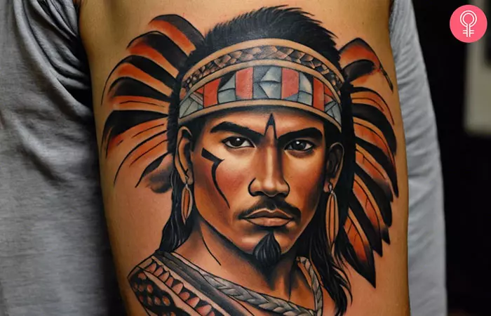 A man with a Taino warrior tattoo on his upper arm