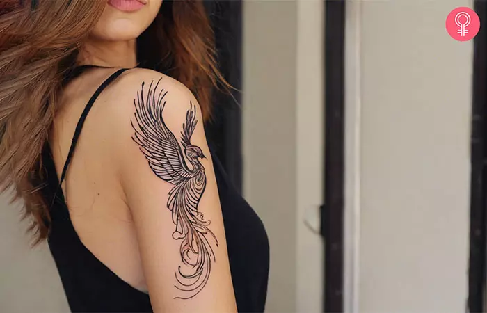 A phoenix growth tattoo on upper the arm