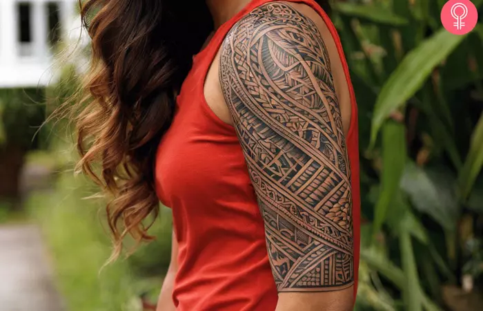 A woman with a Tongan sleeve tattoo