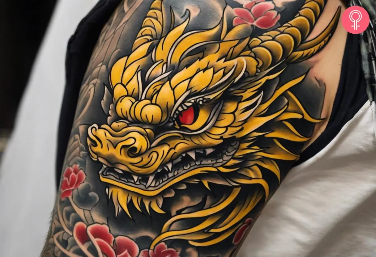 Traditional Japanese dragon tattoo on the upper arm