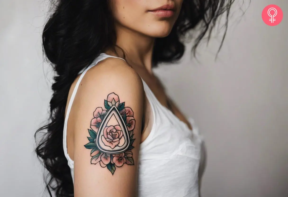 Traditional Planchette tattoo on the arm