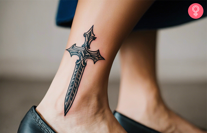  A woman with traditional sword tattoo on her ankle