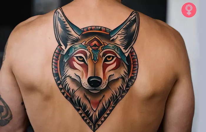 Traditional coyote tattoo on a man’s back