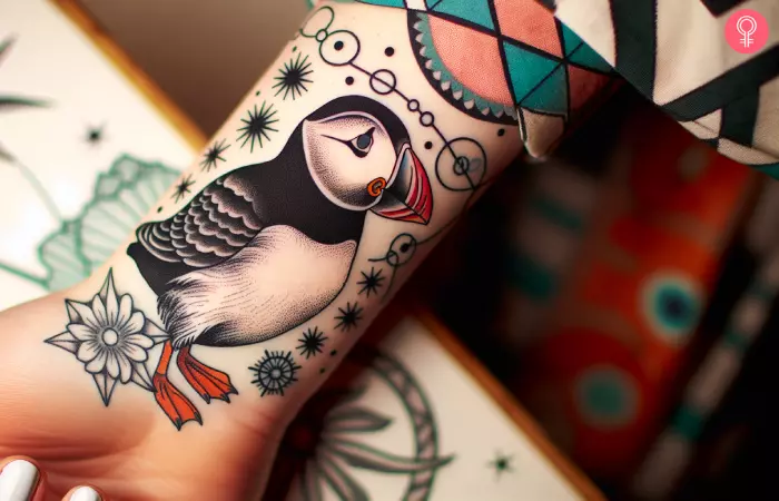 Traditional puffin tattoo on a woman’s wrist