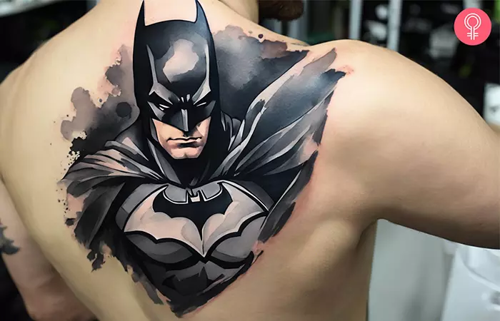 A Batman tattoo on the shoulder blade 