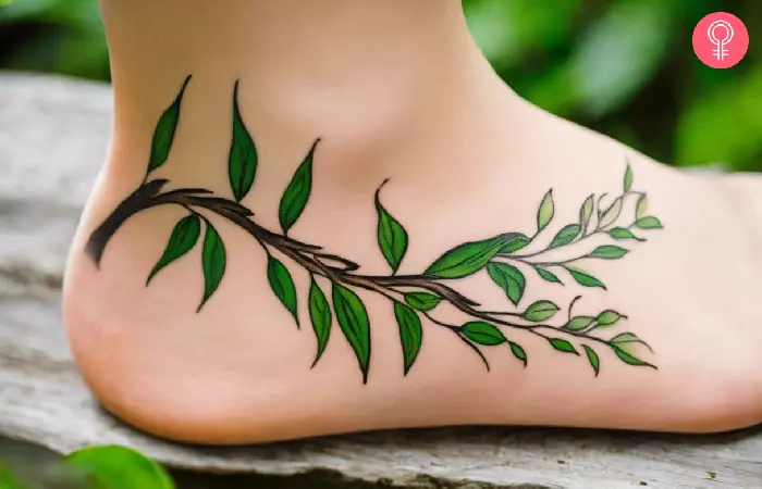 Weeping willow branch tattoo on the ankle
