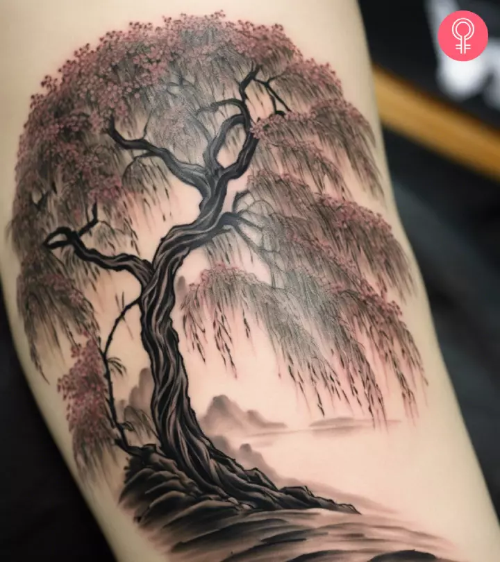 Weeping willow tattoo on upper arm