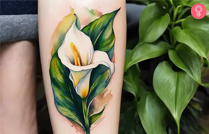 White calla lily tattoo on wrist