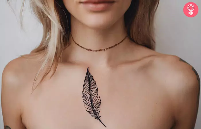 Woman with a feather tattoo on her chest