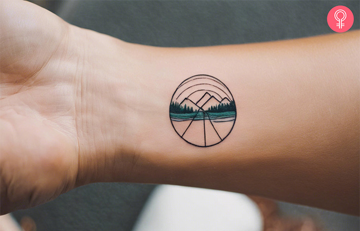 Minimalistic travel tattoo of a landscape