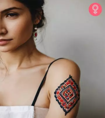 3D flower tattoo on a woman’s upper arm