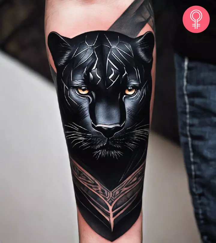 Black panther tattoo on the forearm