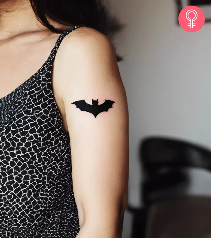 A bat tattoo on a woman’s arm