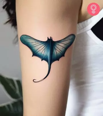 A stingray tattoo on the upper arm