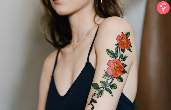 A colorful flower vine on the upper arm