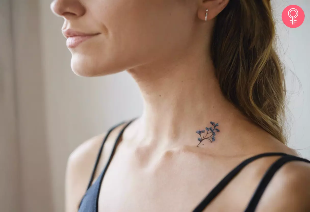 A delicate forget me not tattoo on her neck