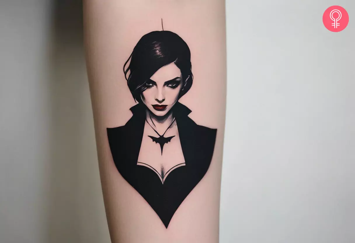 A female vampire tattoo inked on the forearm