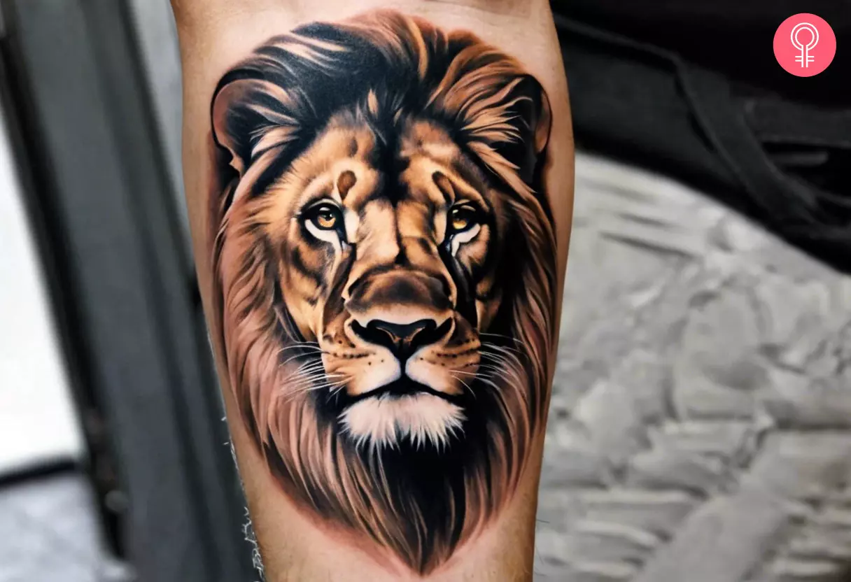 A lion tattoo on a man’s forearm