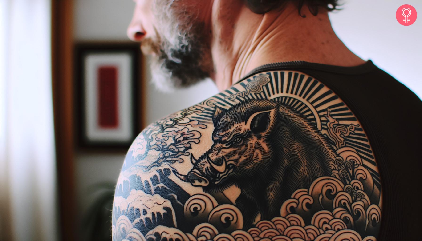 8 Unique Boar Tattoo Ideas For Men And Women 7 A man with a Japanese boar tattoo