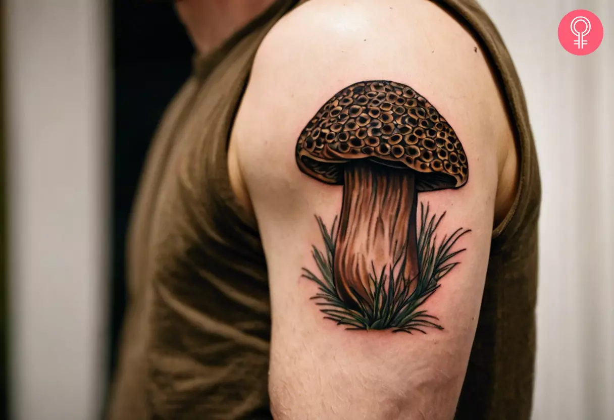 A man with a Morel mushroom tattoo on his upper arm