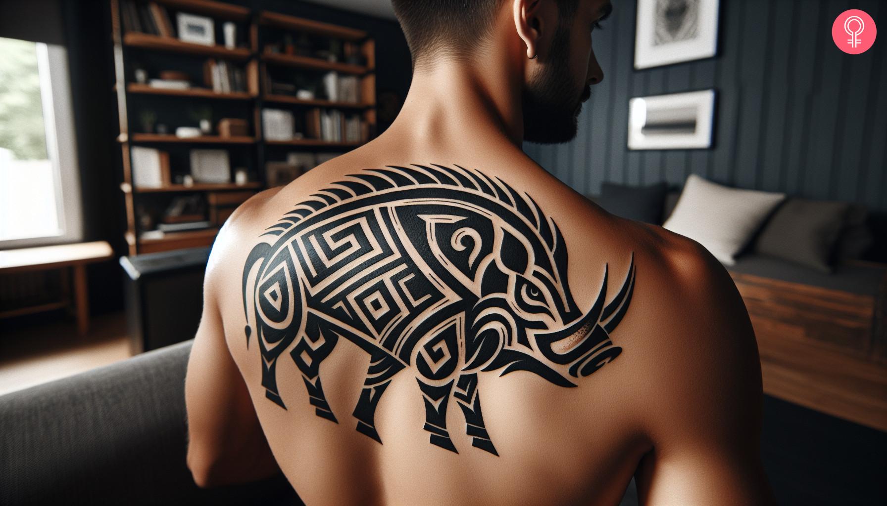 8 Unique Boar Tattoo Ideas For Men And Women 10 A man with a tribal boar tattoo